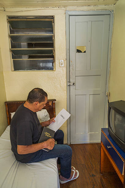 istock Poor northeastern brazilian man in a very simple hotel 636883962