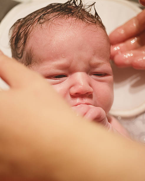 istock Baby Girl Bathtime 636884076