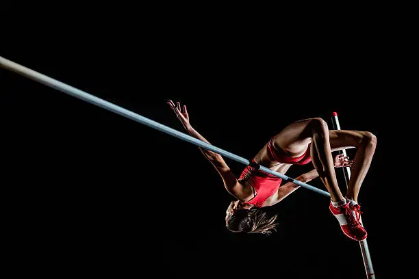 Photo of High jumper performing