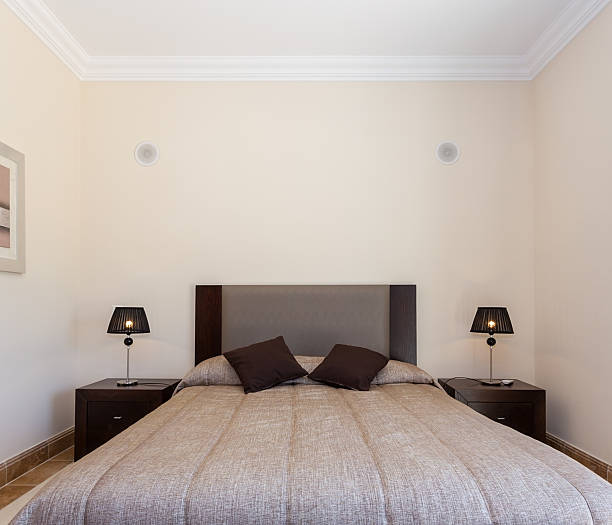 istock Cozy bedroom with a bed. 636887480