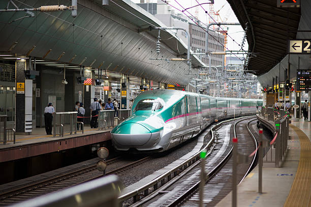 Tokyo, Japan - October 3, 2016: E5 Series Shinkansen stopping at Tokyo Station before departing to Hokkaido.