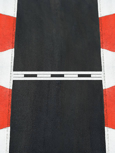 Low angle view of pit row at a Stock car race track.     