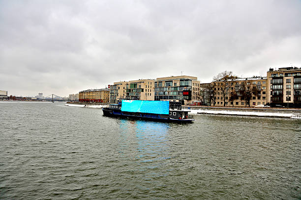 istock The ferry sails along the city river 636894756