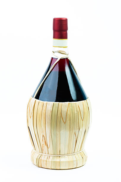 istock Bottle/demijohn of wine isolated on white background 636895442