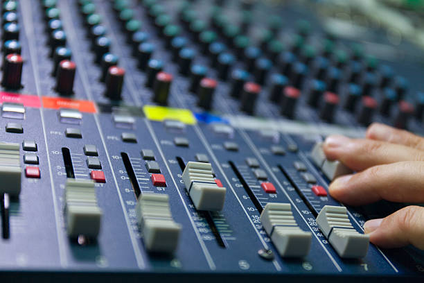 istock selective focus finger tuning of sound mixer close up 636897852
