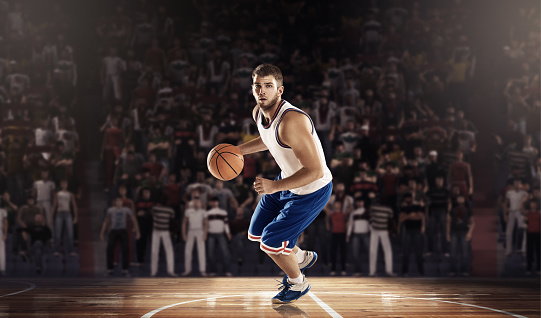 basketball player with ball on professional basketball court arena with tribune and light,, render