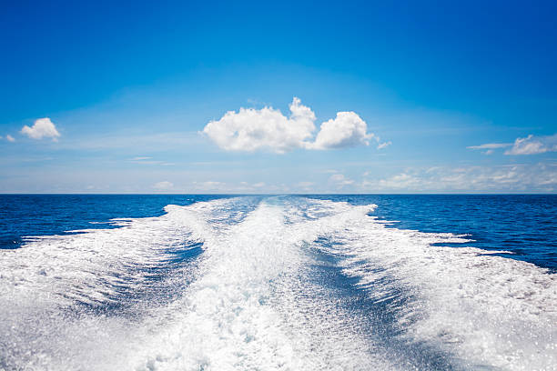 istock Background water surface behind of fast moving motor boat 636899878