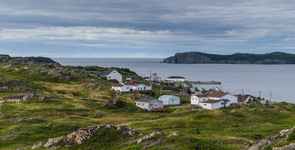 Twillingate Newfoundland.  Small homes along shoreline in coastal village along the fingers of the Island of Newfoundland, Canada.
