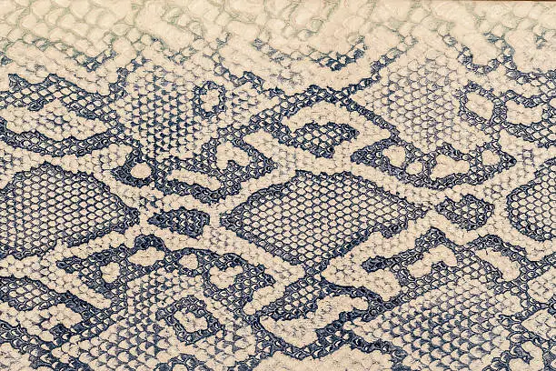 Photo of Texture of genuine leather close-up, embossed under the skin