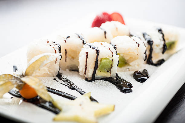Sushi dessert fruit maki with chocolate cream and bananas