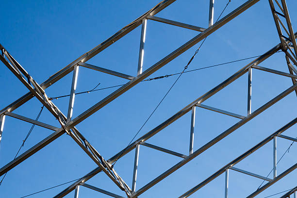 istock Metal trusses against blue sky 636913852