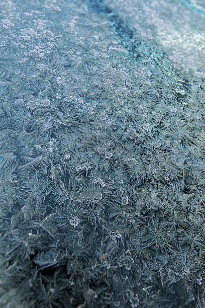 istock Snowflake on the window of the car 636913886