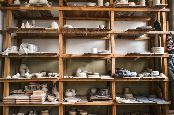 istock racks in a pottery workshop in which there are potter 636918052