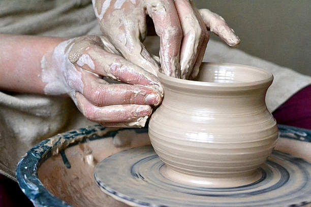 potter making vase from clay potter making vase from clay. Hands close-up master pottery making stock pictures, royalty-free photos & images