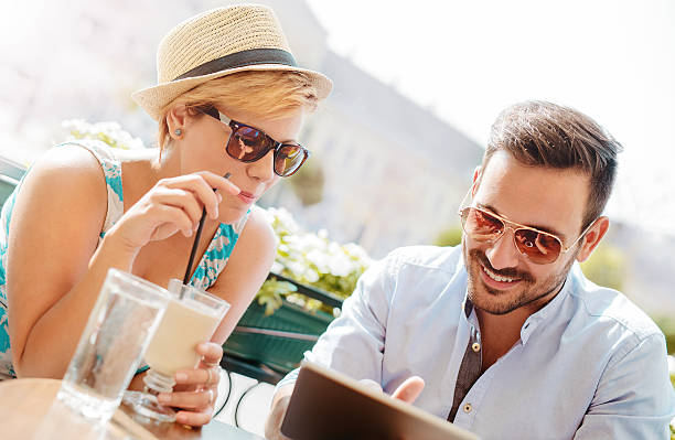 istock Young couple sitting in the cafe 636921400