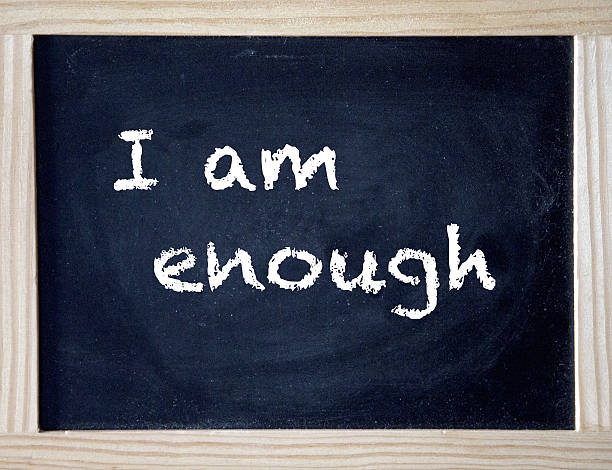 istock I Am Enough written on black chalk board 636922008