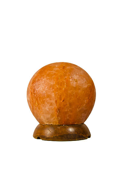 istock Hymalayan salt lamp isolated on white background 636923086
