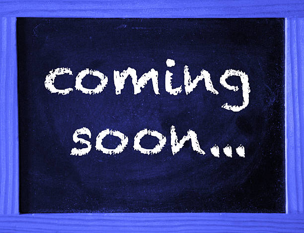 istock Coming Soon written on blue chalk board 636923144