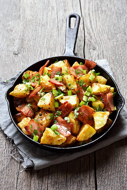 istock Fried potatoes with bacon and green onion 636924294