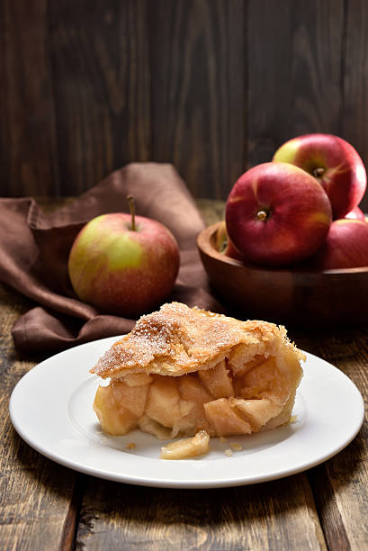 istock Piece of apple pie ad fresh fruits 636924616