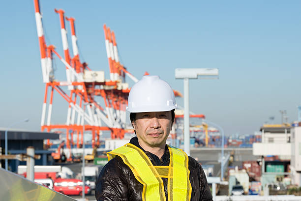 istock Japanese worker at commercial dock 636924668