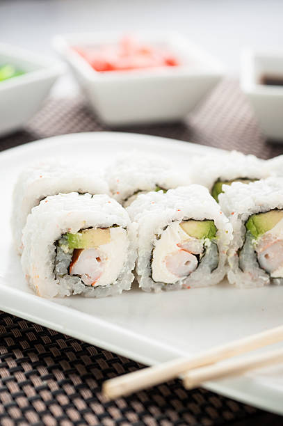 istock Uramaki sushi maki with prawns on a dish 636926820