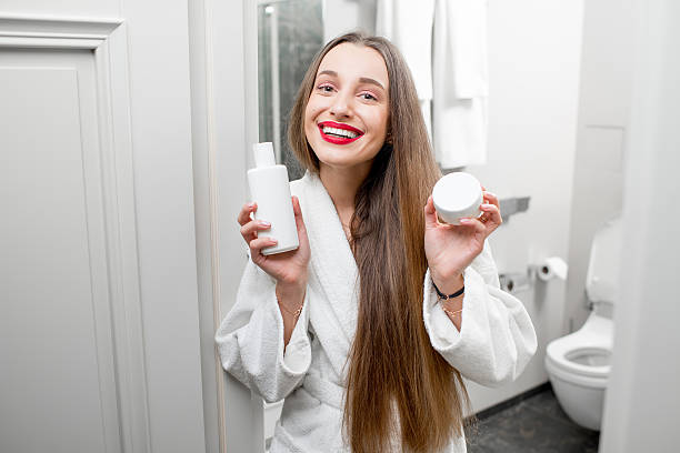 istock Woman with cosmetics in the bathroom 636929794
