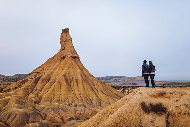 istock Young couple at desert 636930834