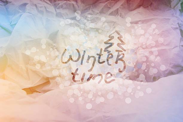 istock Winter time. Paper color texture. Bokeh background. 636934444