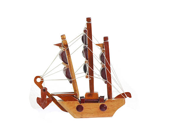 istock wood ship model isolated on white background 636935810