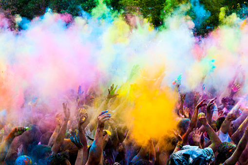 Madrid, Spain - August 8, 2015: : People celebrated Monsoon Holi Festival of Colors on August 8, 2015 in Madrid, Spain. People dancing and celebrating during the color throw.