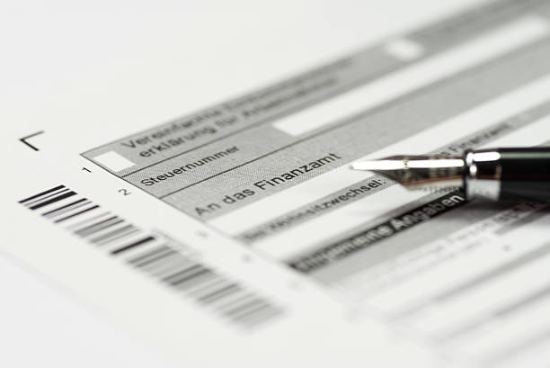 istock Tax return and fountain pen 636941848