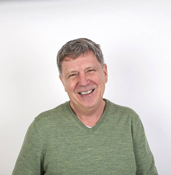 istock friendly happy laughing mature man 636942688