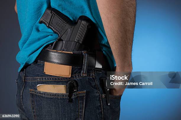 Man With Everyday Carry Items Stock Photo - Download Image Now - Concealed Carry, Hiding, Carrying