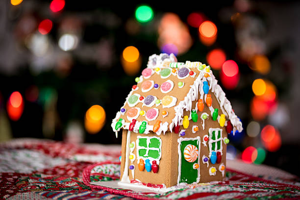 christmas lights and a gingerbread house - pepparkakshus bildbanksfoton och bilder