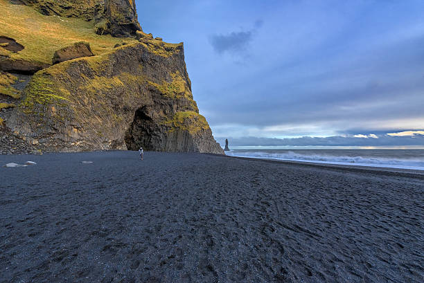 istock Famous Reynisdrangar rock formations at black Reynisfjara Beach 636951920