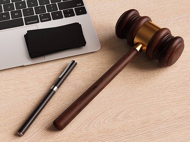 istock Judge's gavel on wooden table. 3D illustration 636954432