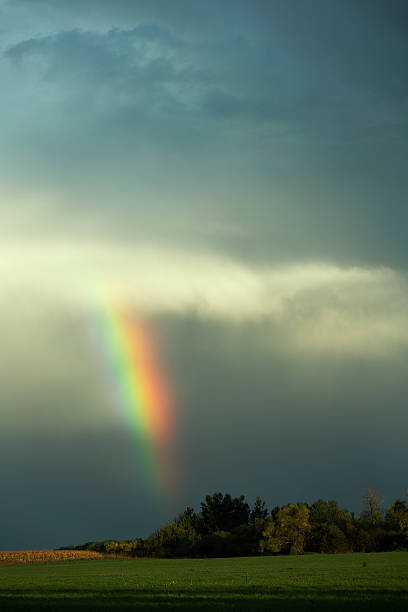 istock Early Autumn in Minnesota - Rainbow in Cloudy Sky 636954732