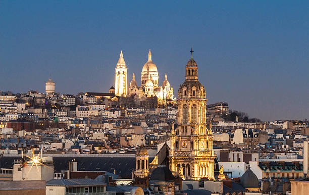 istock The Sacre Coeur basilica and Saint Trinity church 636954932