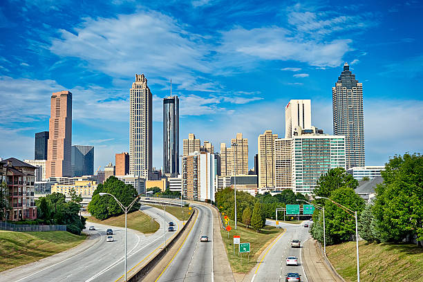 istock atlanta downtown skyline with blue sky 636956422