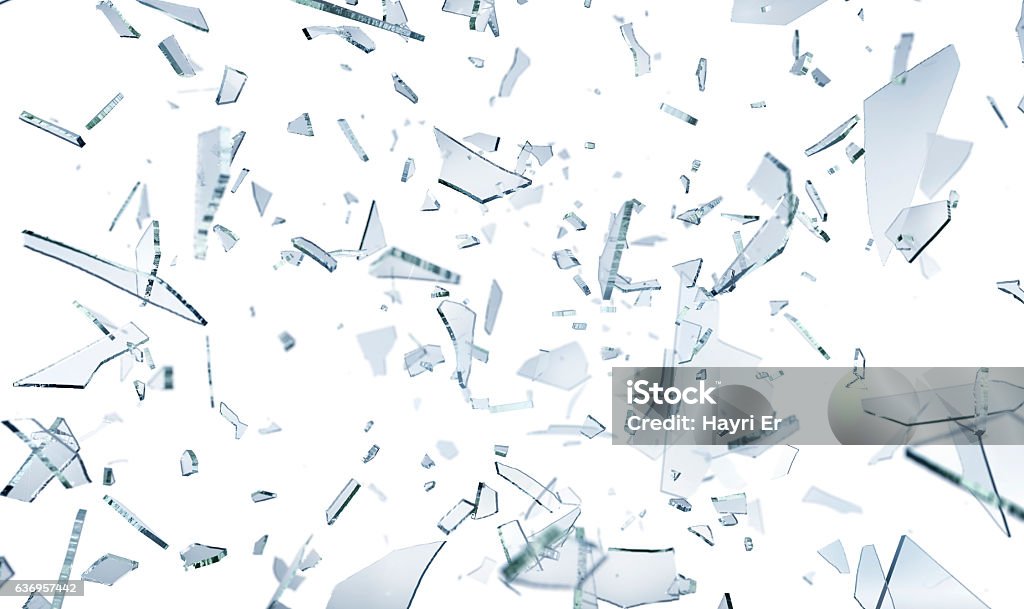 Shattering glass pieces on white Shattering window glass. Against a White background. Shattered Glass Stock Photo