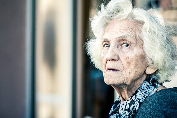 istock Senior Woman Lost in Thoughts 636958010