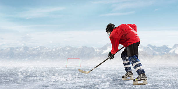 istock Hockey player on the ice . Mixed media 636959130