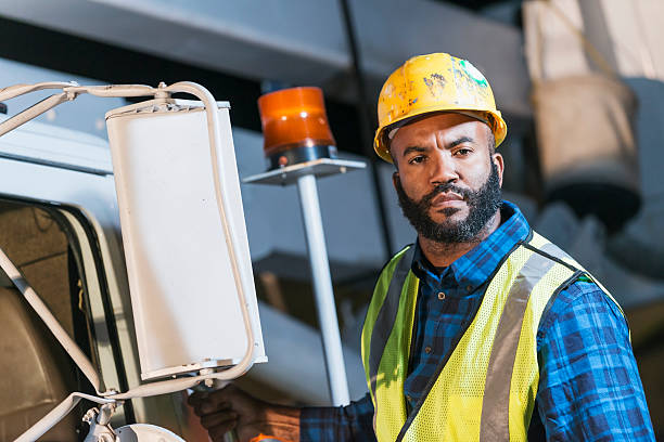 istock African American man with cherry picker truck 636961694