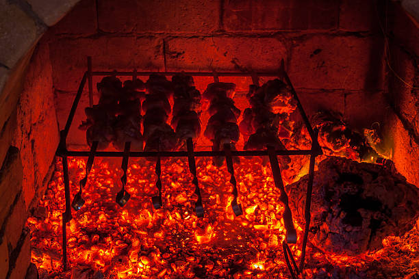istock Burning fireplace and barbecue pork 636962078