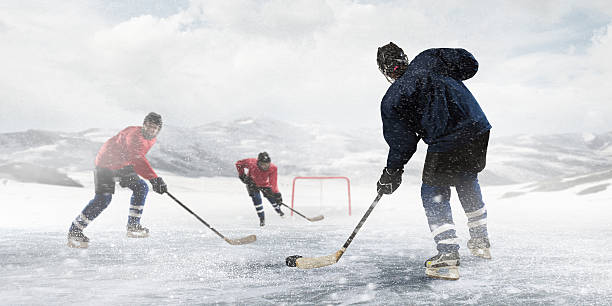 istock Hockey players on the ice . Mixed media 636962872
