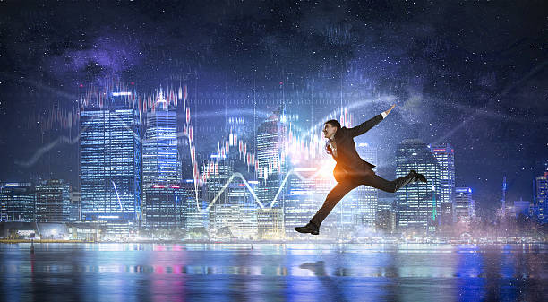 istock Businessman celebrating success . Mixed media 636963464