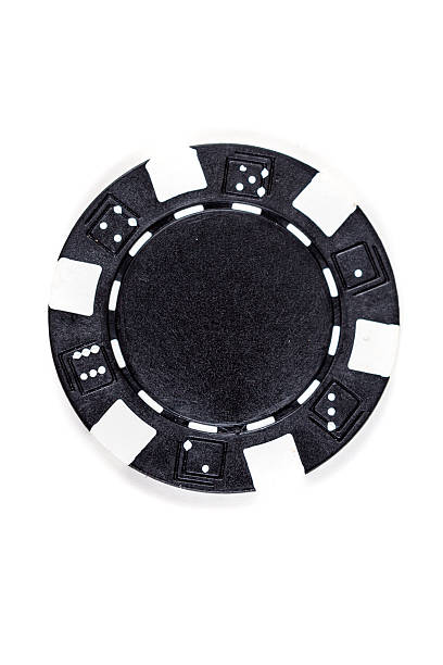 istock Black poker chip isolated on a white background 636963844
