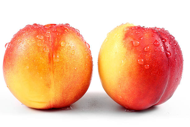 necrarine bagnate - peach nectarine wet drop foto e immagini stock