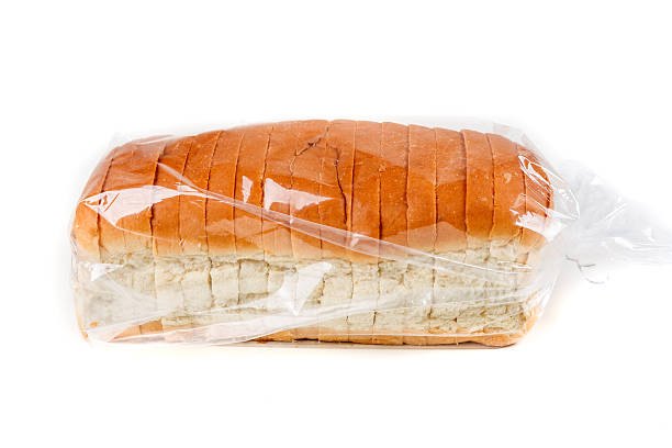 istock Loaf of whole grain bread in a bag 636964868